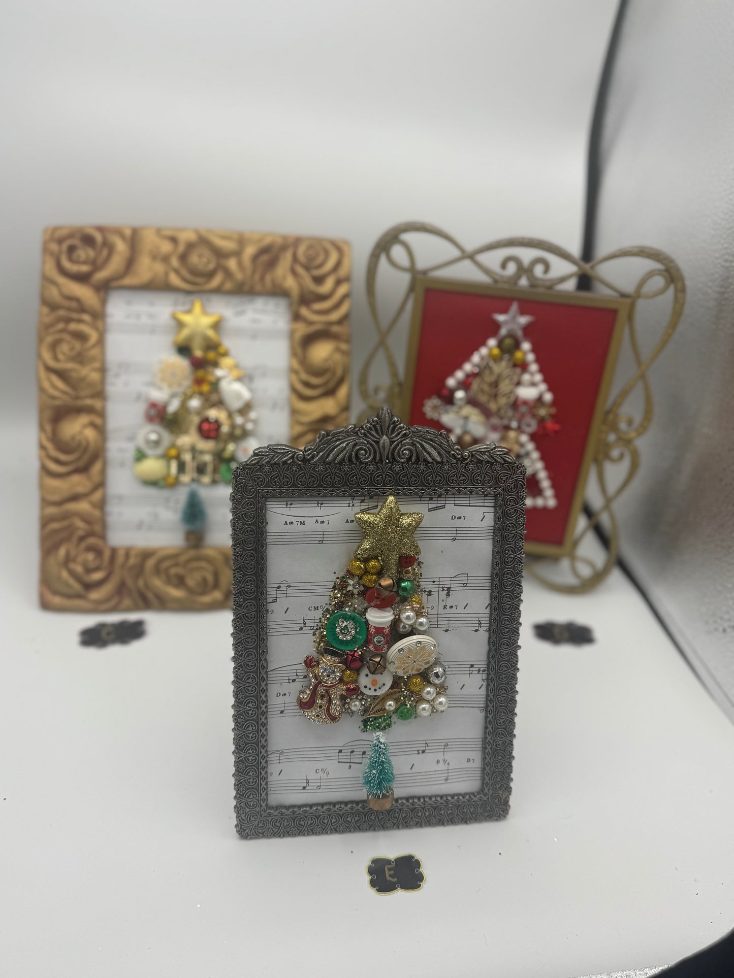 Delightful music-inspired holiday up-cycled jewelry and miniatures framed decor